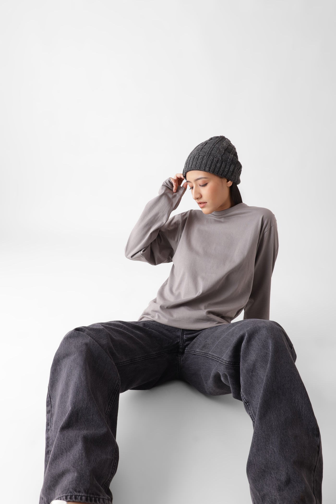 Buy classic long sleeve grey tshirt for women - sitting on the floor - unbound crew