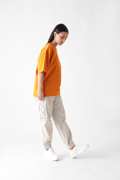 Classic oversized orange tshirt for women - side view full - unbound crew