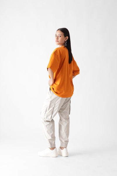 Classic oversized orange tshirt for women - back view full - unbound crew