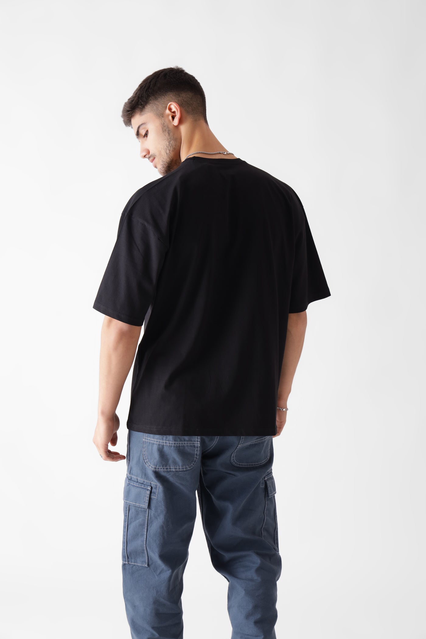 Classic oversized black tshirt for men - back view - unbound crew