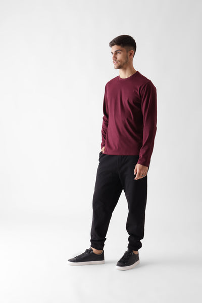 Classic long sleeve wine tshirt for men - looking sideways front view - unbound crew