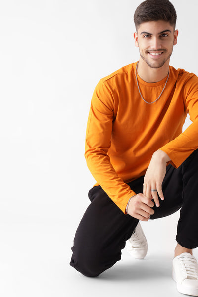 Classic long sleeve orange tshirt for men - one kneel down pose - unbound crew