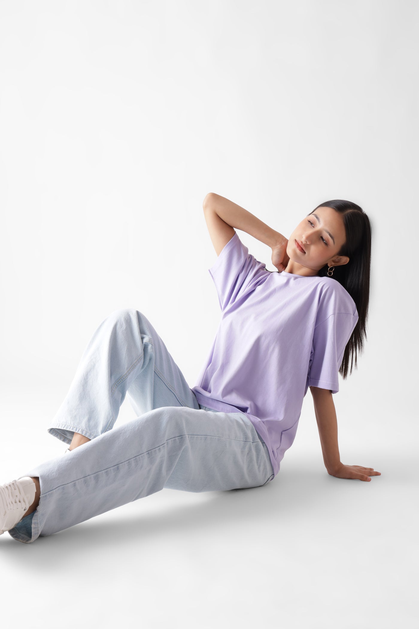 Classic oversized lavender tshirt for women - sitting on the floor - unbound crew